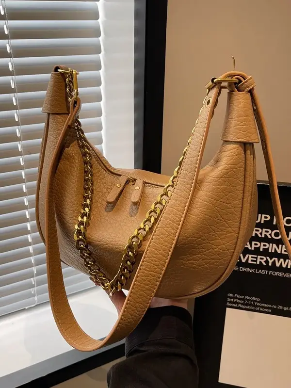 Women's tan chain bag with gold strap and crescent design - Image 4