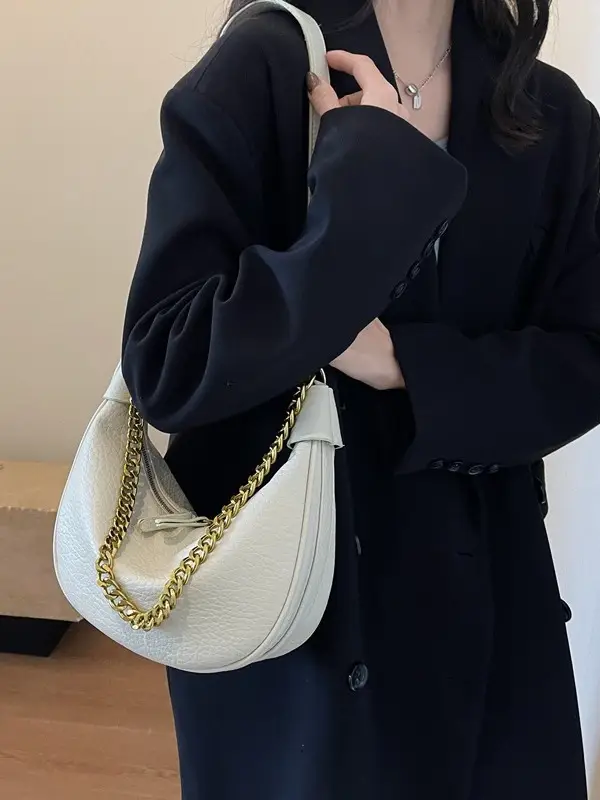 Women's tan chain bag with gold strap and crescent design - Image 5