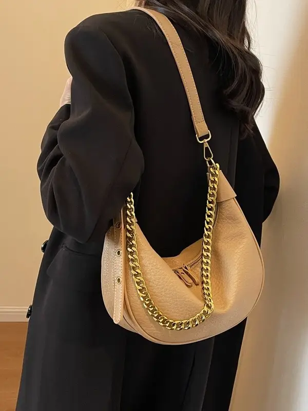 Women's tan chain bag with gold strap and crescent design - Image 7