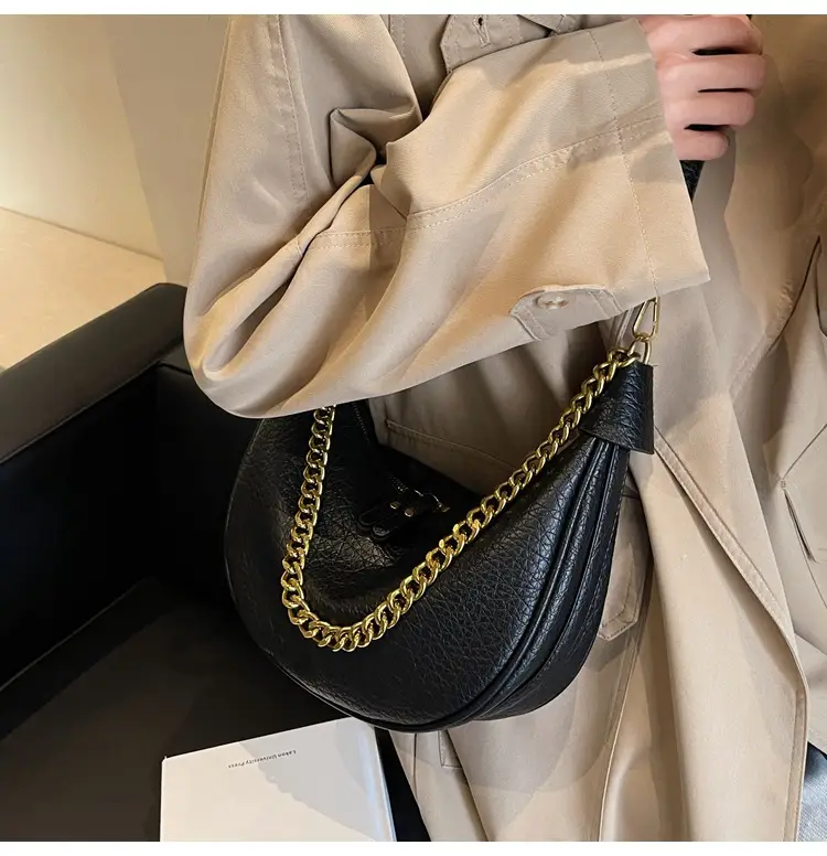 Women's tan chain bag with gold strap and crescent design — feature 13