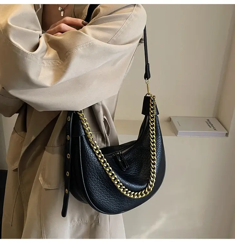 Women's tan chain bag with gold strap and crescent design — feature 14