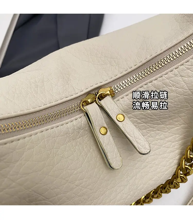 Women's tan chain bag with gold strap and crescent design — feature 4