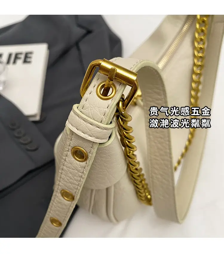 Women's tan chain bag with gold strap and crescent design — feature 5