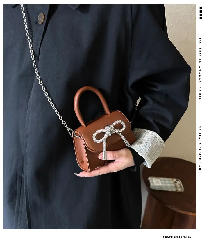 Black Bow Crossbody Bag with Diamond Chain — feature 1