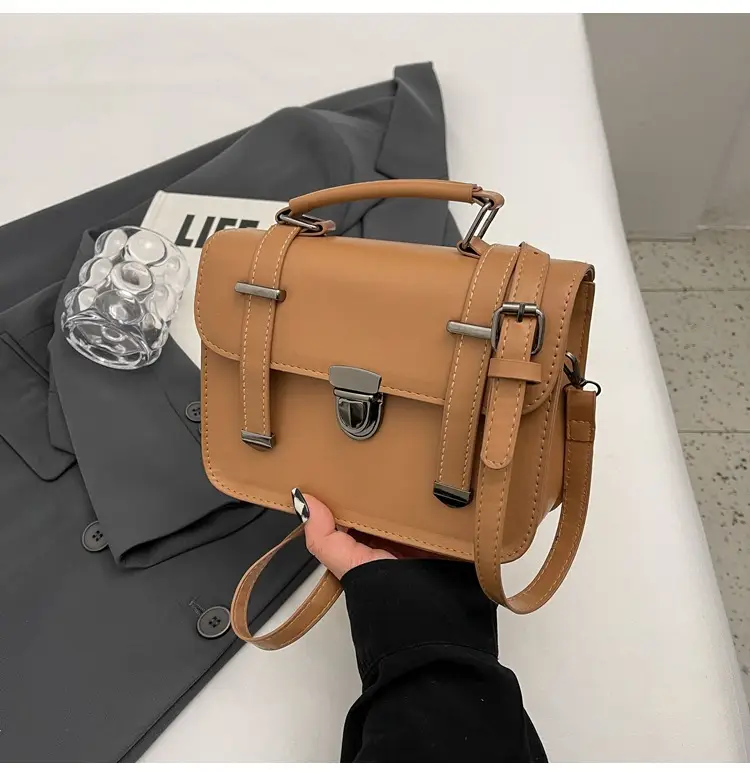 Women's tan leather shoulder messenger bag 2023 — feature 24