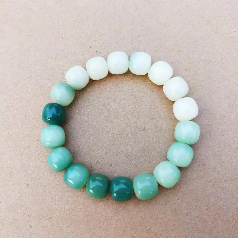 Women's Green Jade Bodhi Root Bracelet with White Beads — feature 1