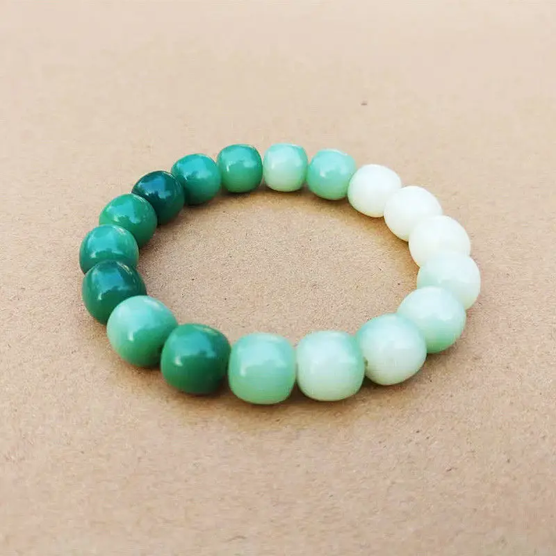 Women's Green Jade Bodhi Root Bracelet with White Beads — feature 2