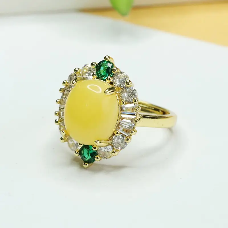 Aiyu Yellow Amber Ring with Green Emeralds - Image 3