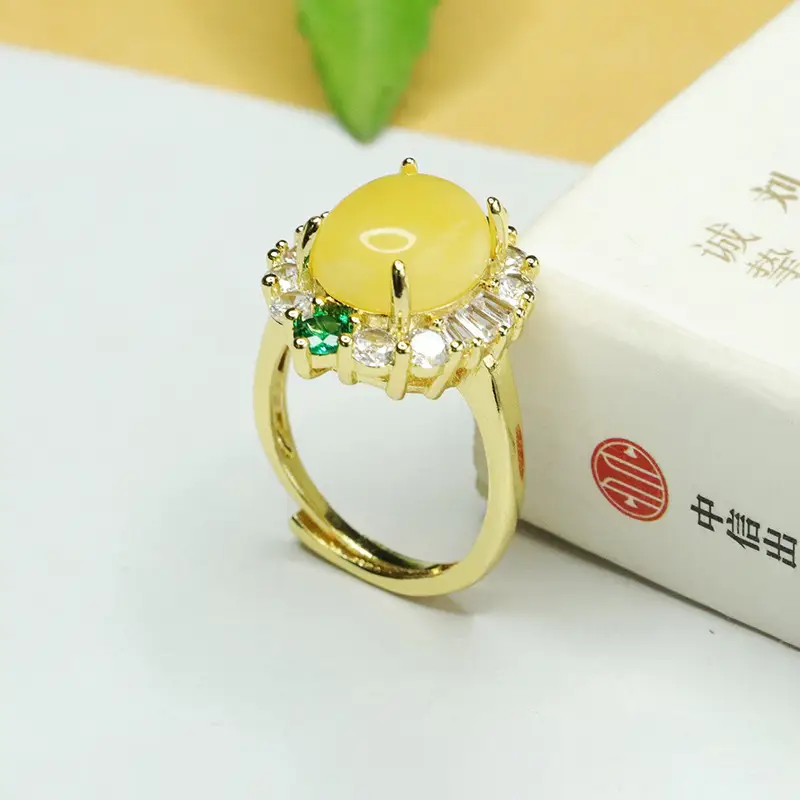 Aiyu Yellow Amber Ring with Green Emeralds — feature 10