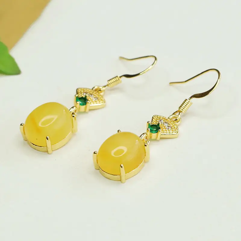 Aiyu Yellow Beeswax Fan Shaped Earrings — feature 1