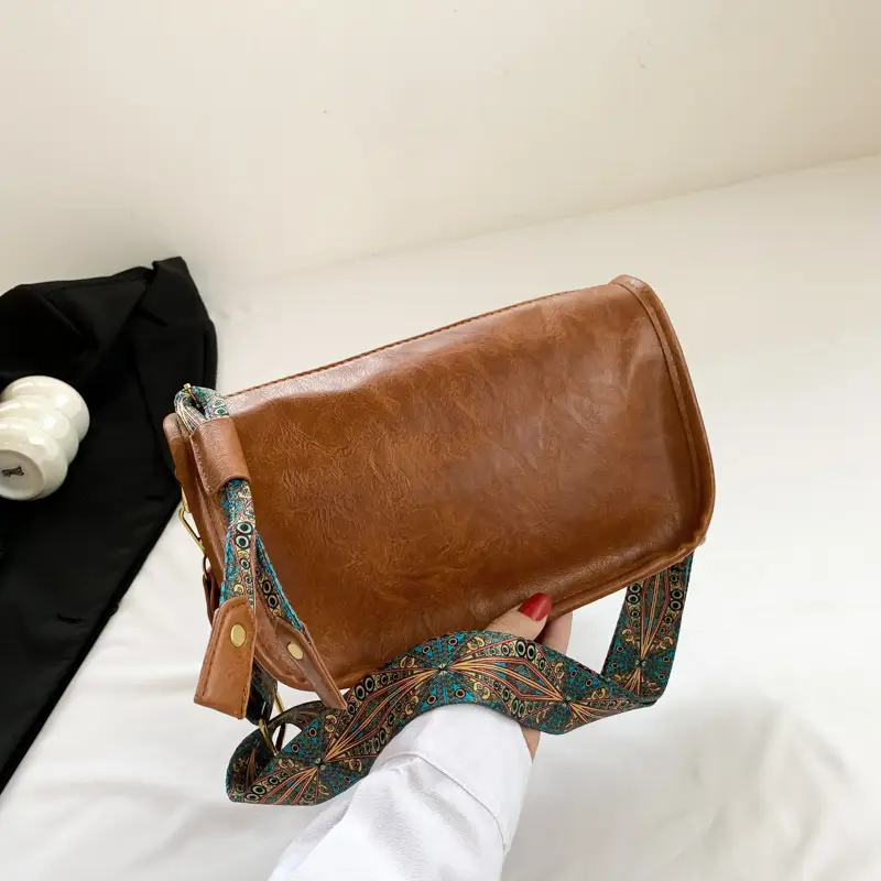 Brown Leather Crossbody Bag with Patterned Strap — feature 13