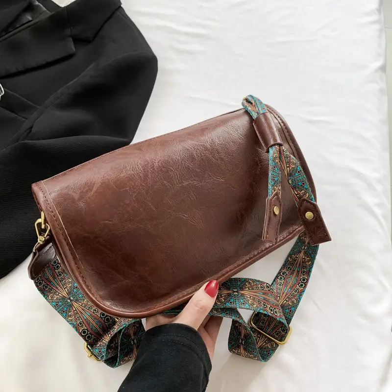 Brown Leather Crossbody Bag with Patterned Strap — feature 14
