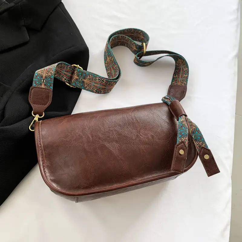 Brown Leather Crossbody Bag with Patterned Strap — feature 17
