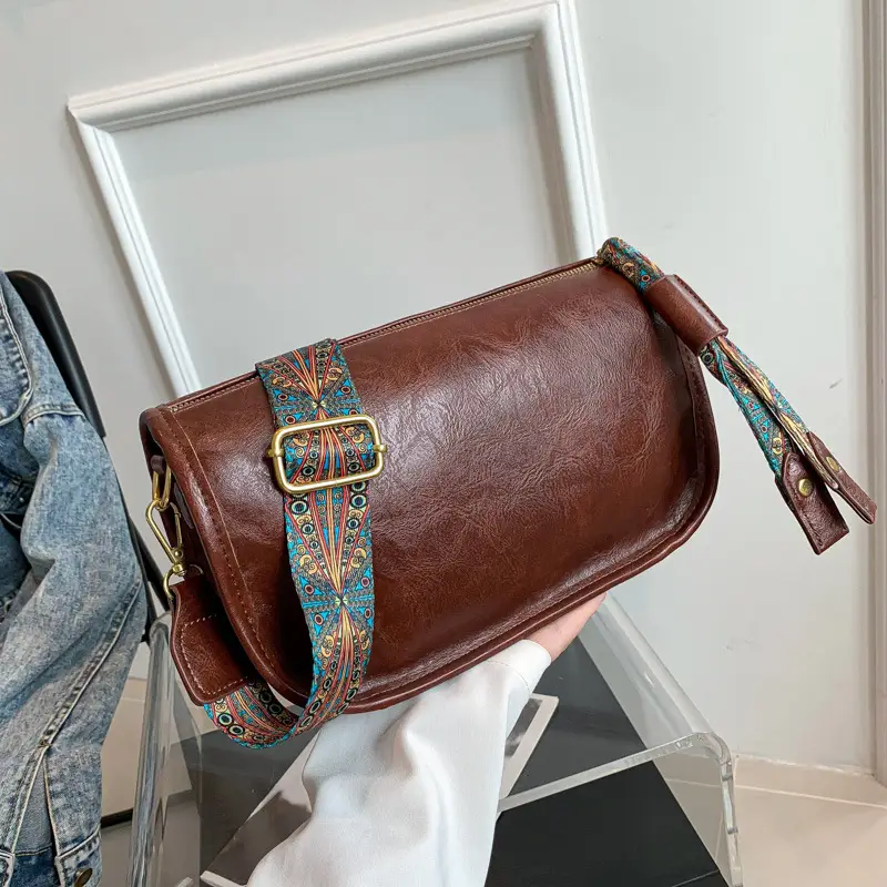 Brown Leather Crossbody Bag with Patterned Strap — feature 7