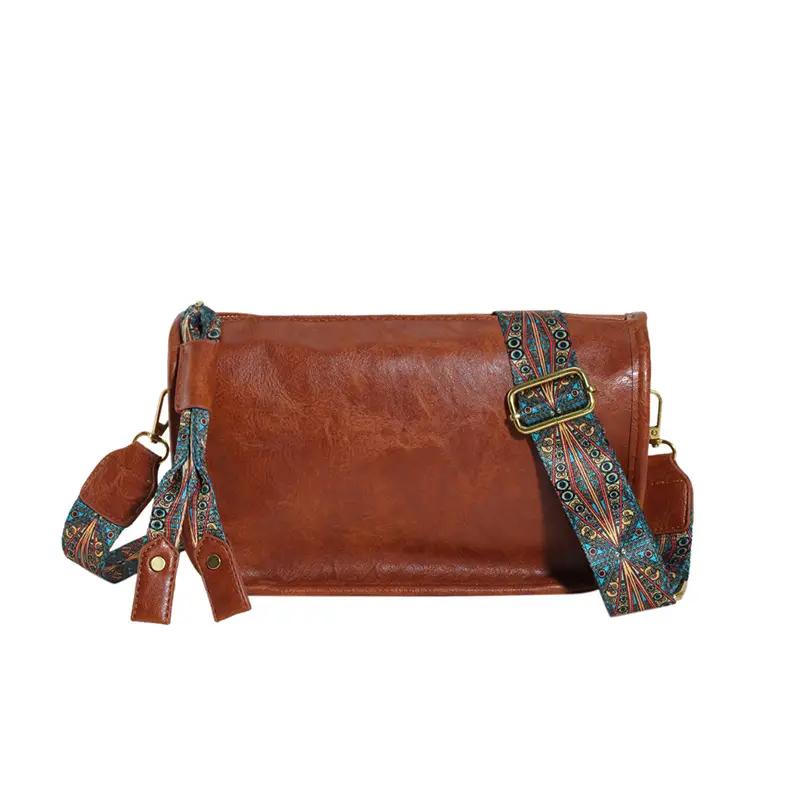 Brown Leather Crossbody Bag with Patterned Strap - Image 2