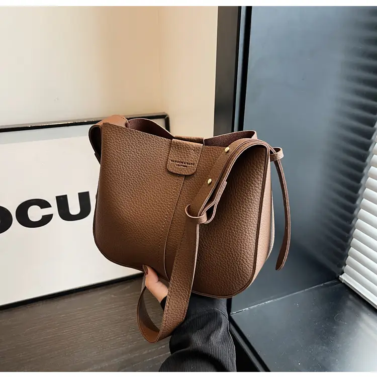 Women's Tan Bucket Bag with Crossbody Strap 2025 — feature 21