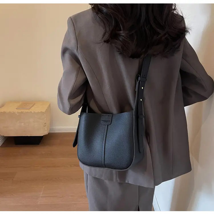Women's Tan Bucket Bag with Crossbody Strap 2025 — feature 36