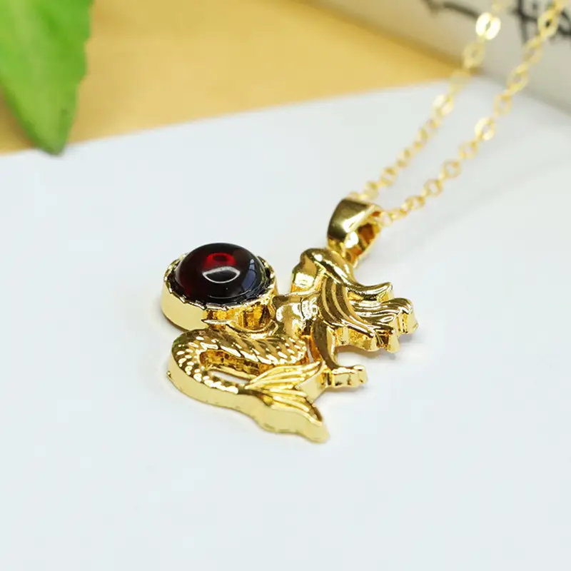 Gold Mermaid Necklace with Blood Amber Pendant — feature 9
