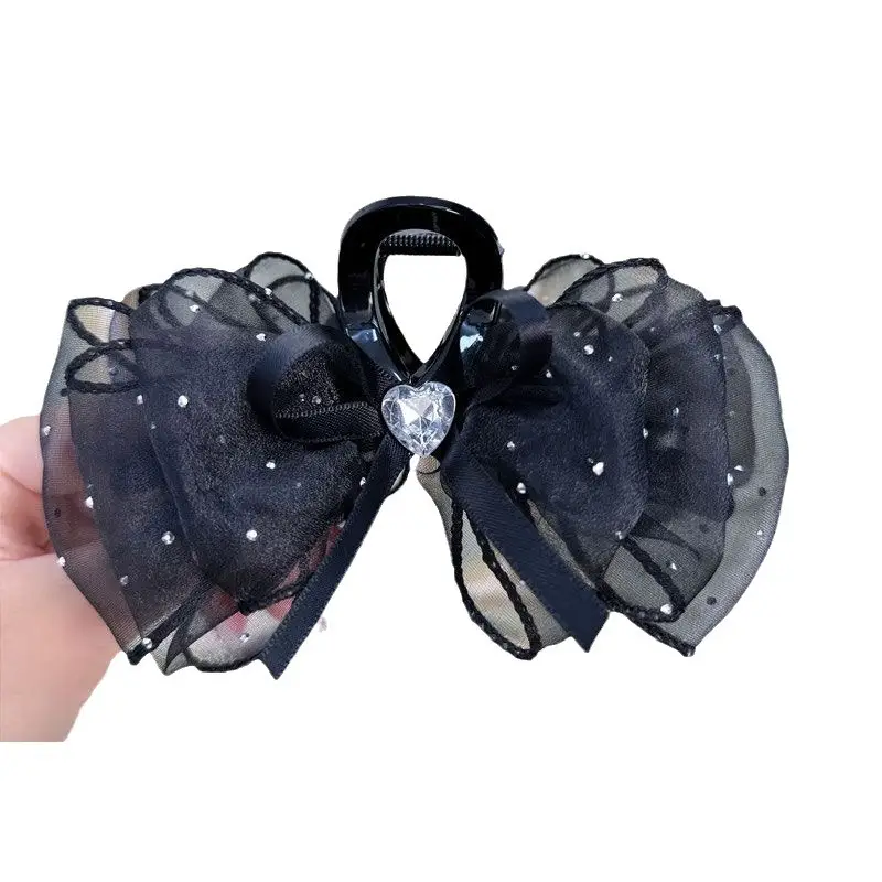 Black Sparkly Bow Hair Clip with Heart Detail - Image 7