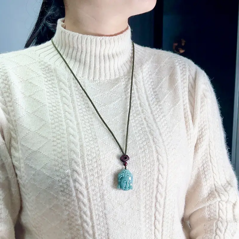 Ice-Clear Blue Buddha Head Jade Pendant with Silk Chain