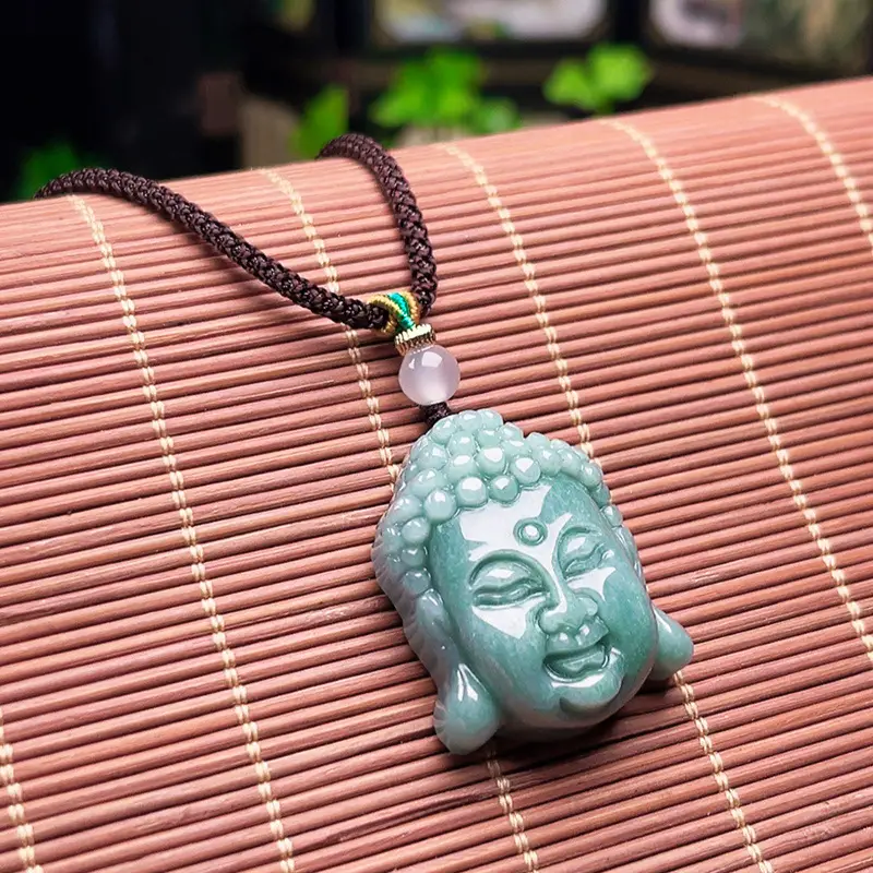 Ice-Clear Blue Buddha Head Jade Pendant with Silk Chain