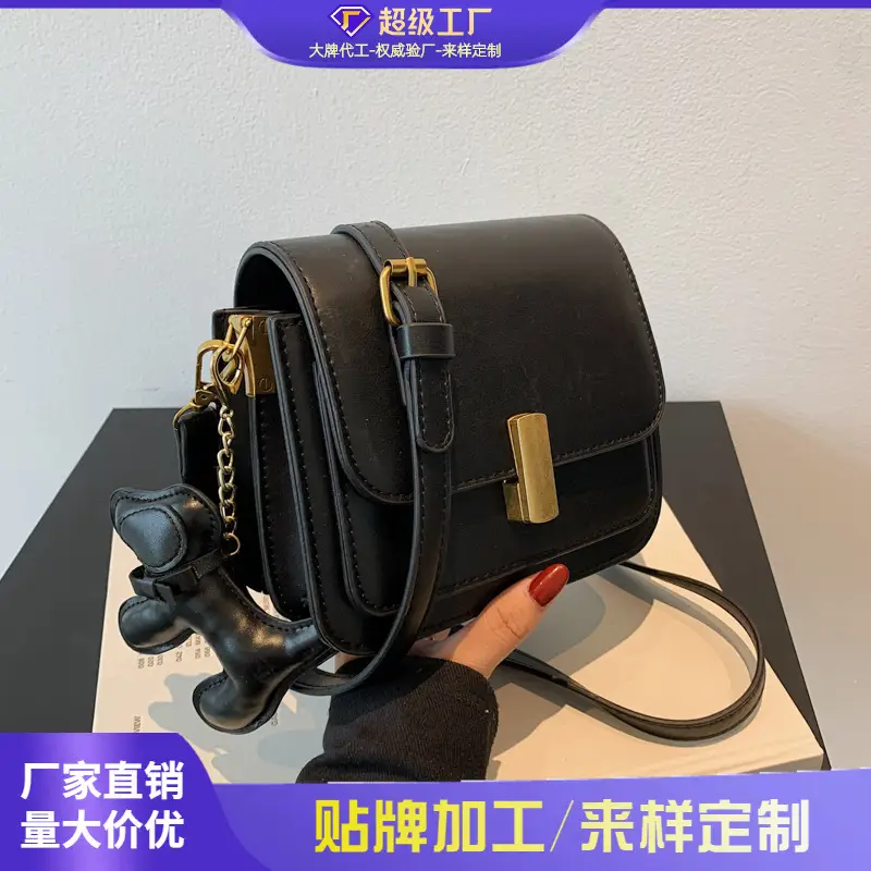 Women's Black Crossbody Bag with Gold Clasp