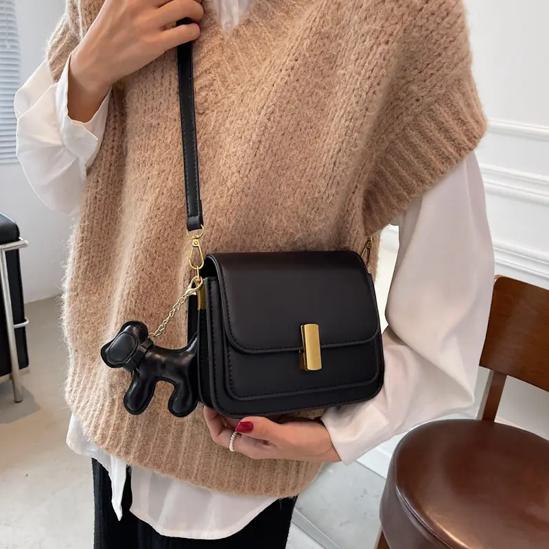 Women's Black Crossbody Bag with Gold Clasp