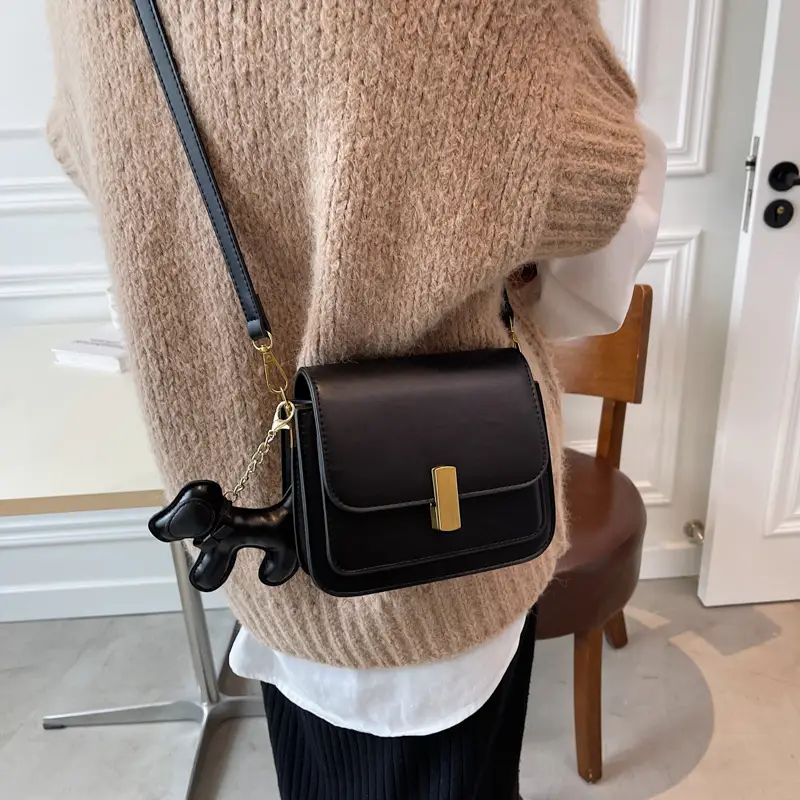 Women's Black Crossbody Bag with Gold Clasp