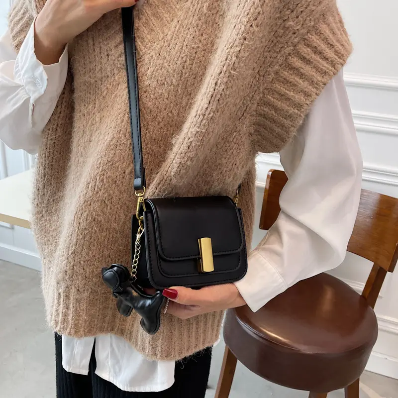 Women's Black Crossbody Bag with Gold Clasp