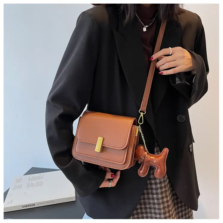 Women's Black Crossbody Bag with Gold Clasp — feature 23