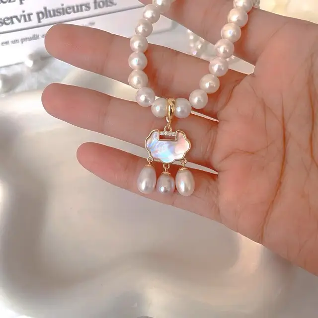 14K Gold Pearl Peace Lock Pendant for Women - Image 5