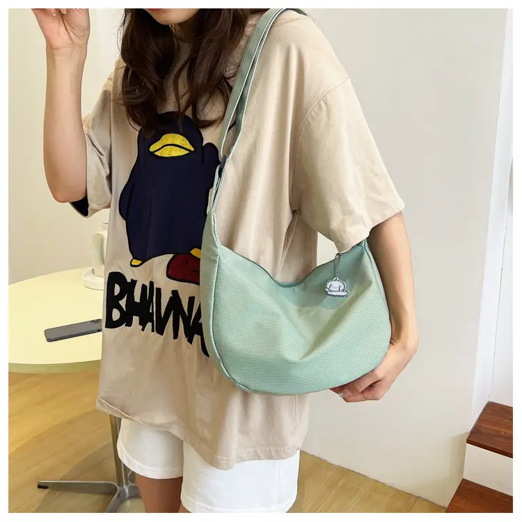 Japanese Style 2022 Retro Chic Girl Pure Color Soft Girl Shoulder Bag K-Style Trendy Ins Simple Crossbody Bag Dumpling Bag — feature 23