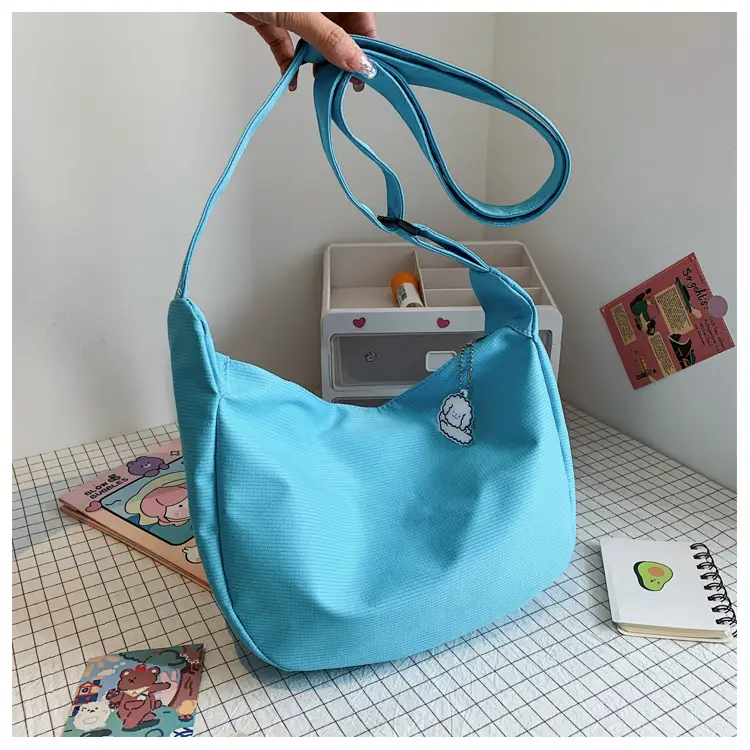 Japanese Style 2022 Retro Chic Girl Pure Color Soft Girl Shoulder Bag K-Style Trendy Ins Simple Crossbody Bag Dumpling Bag — feature 36