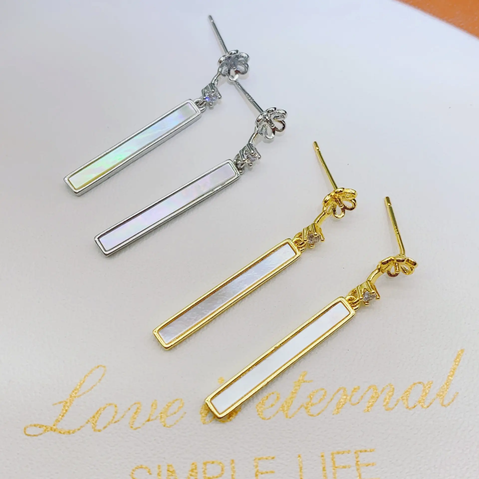Vertical Pearl Earrings Gold Plated Light Luxury Small — feature 9