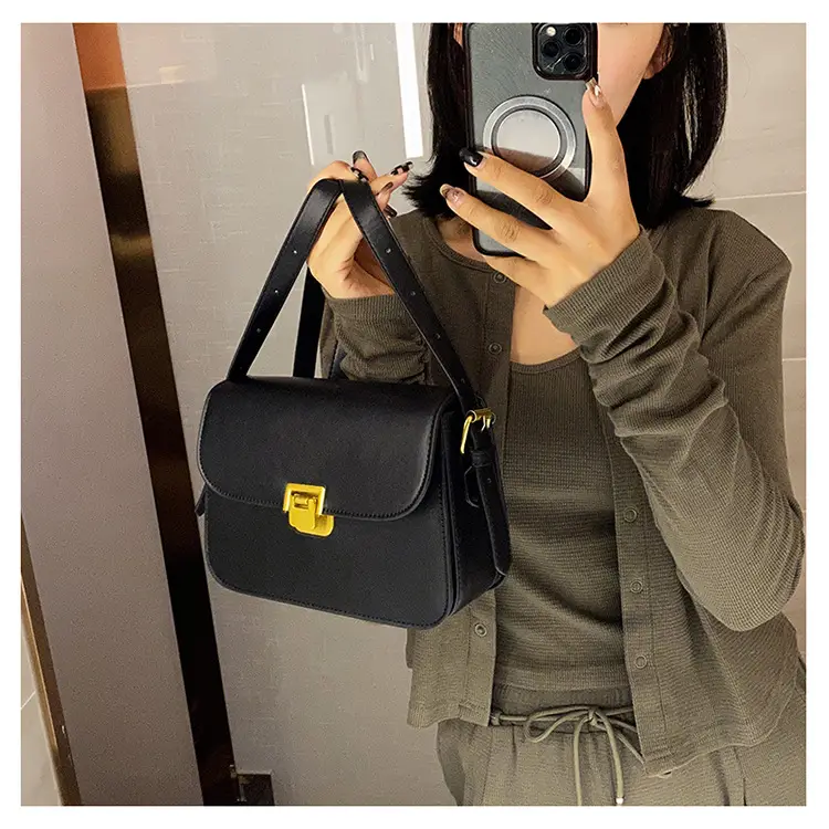 White Leather Crossbody Bag with Gold Clasp — feature 13
