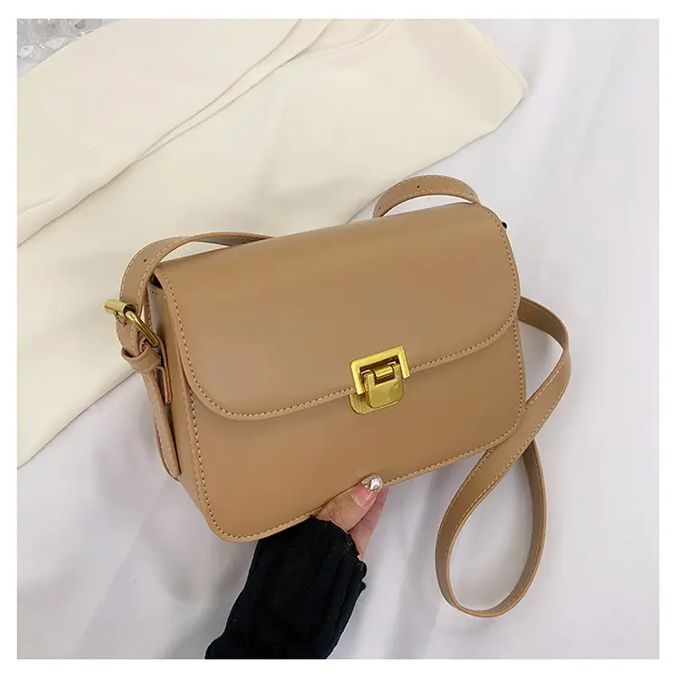 White Leather Crossbody Bag with Gold Clasp — feature 26