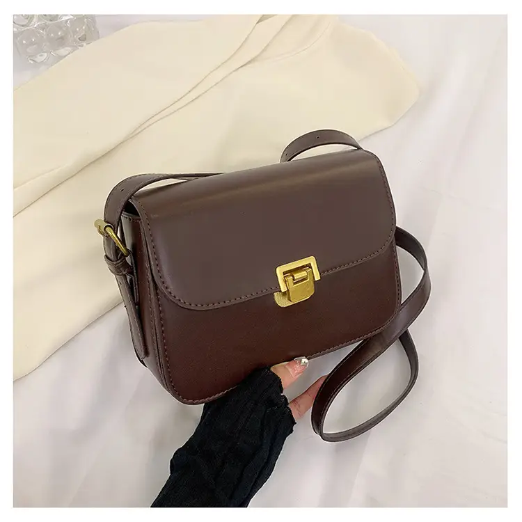 White Leather Crossbody Bag with Gold Clasp — feature 27