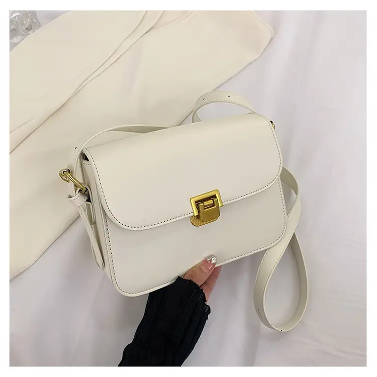 White Leather Crossbody Bag with Gold Clasp — feature 29