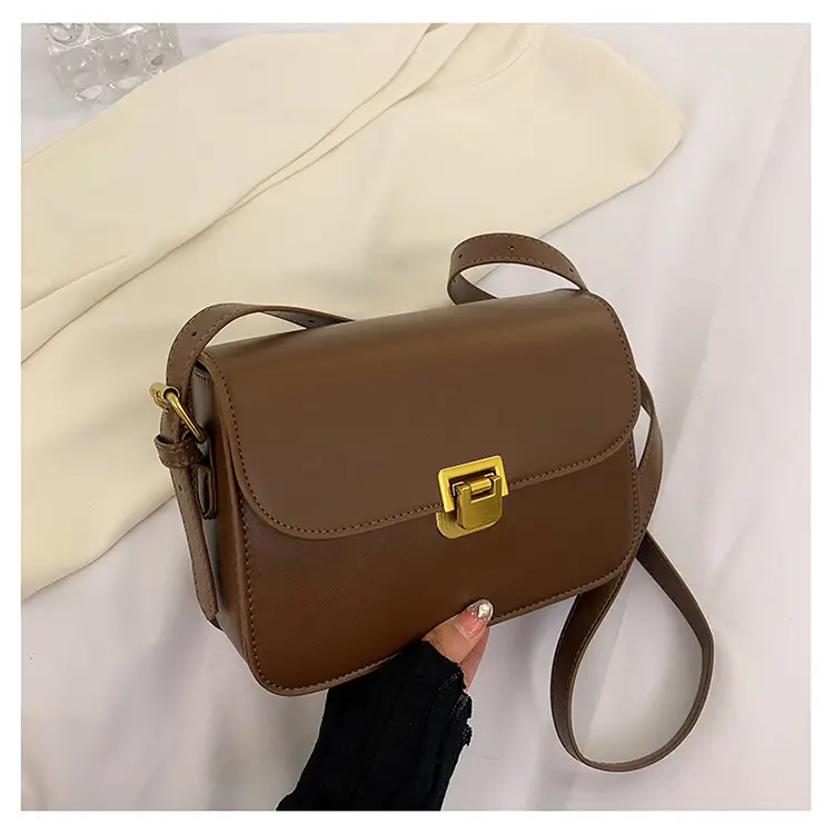 White Leather Crossbody Bag with Gold Clasp — feature 30