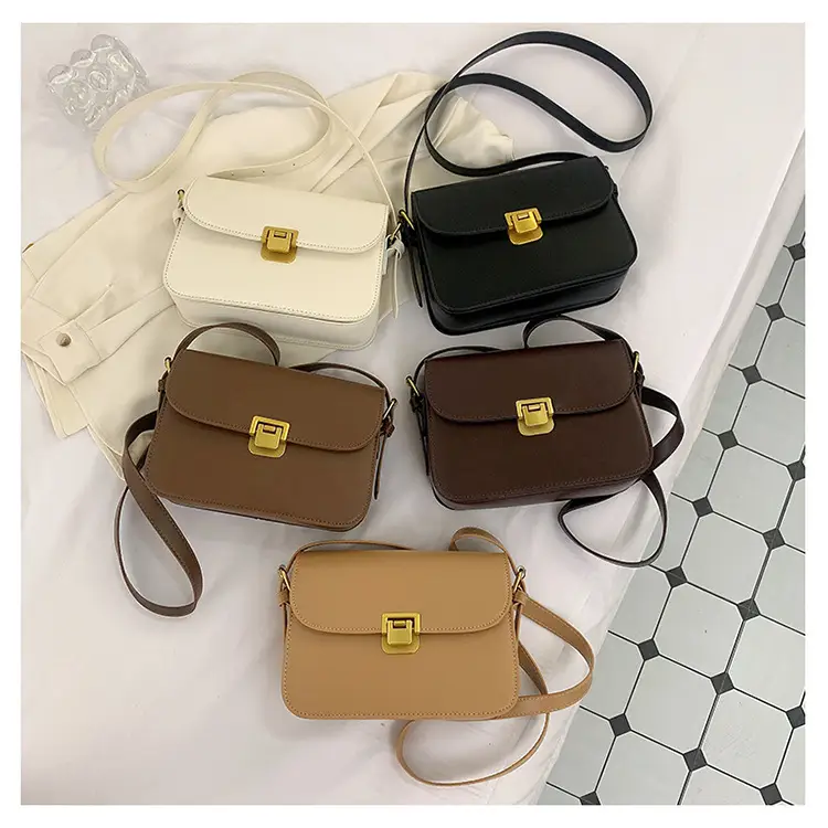 White Leather Crossbody Bag with Gold Clasp — feature 31