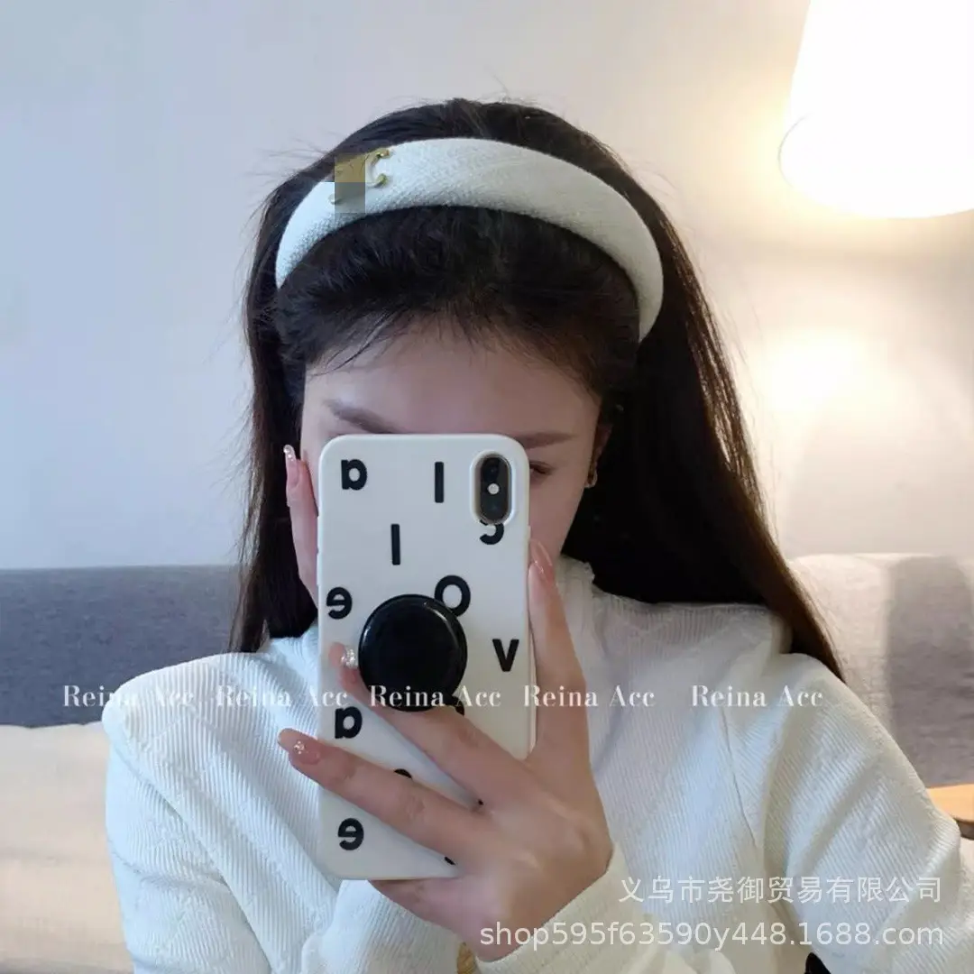 2025 Chanel-Style Black Swirl Headband with Gold Logo — feature 3