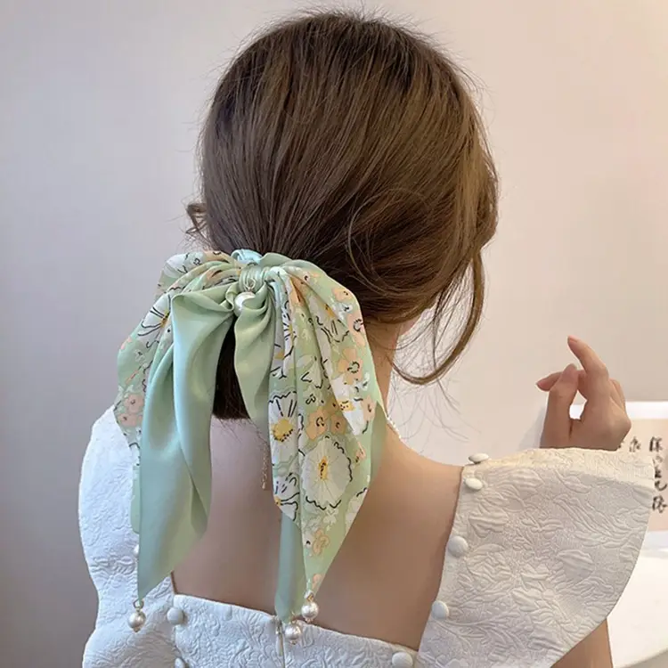 # Green-Pearl Bow Hair Rings