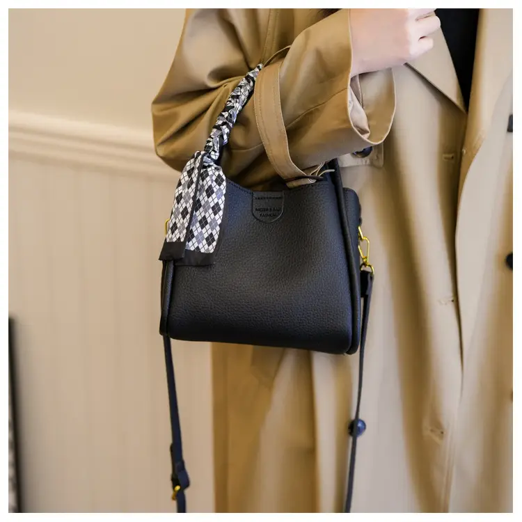 Women's Brown Leather Bucket Bag with Bow Handle — feature 11