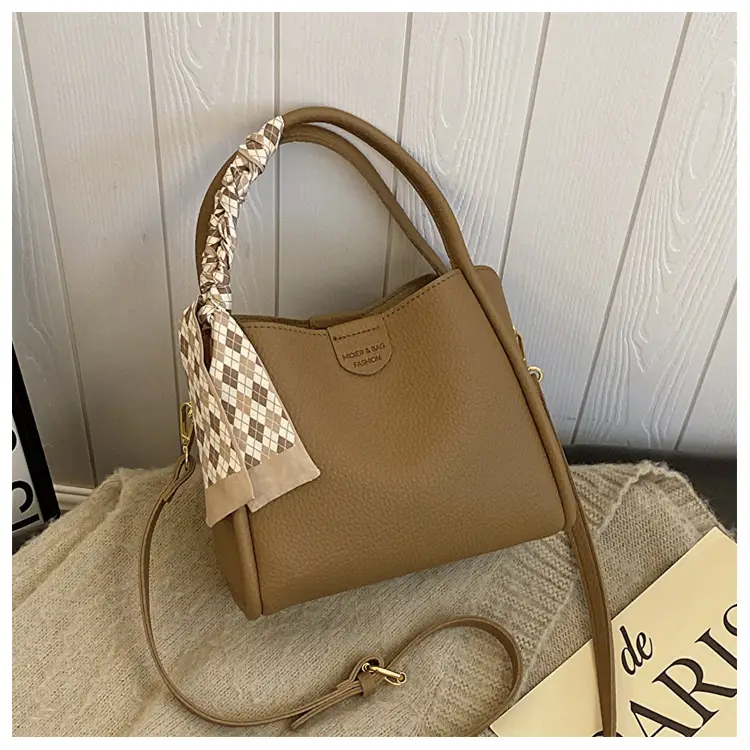 Women's Brown Leather Bucket Bag with Bow Handle — feature 24