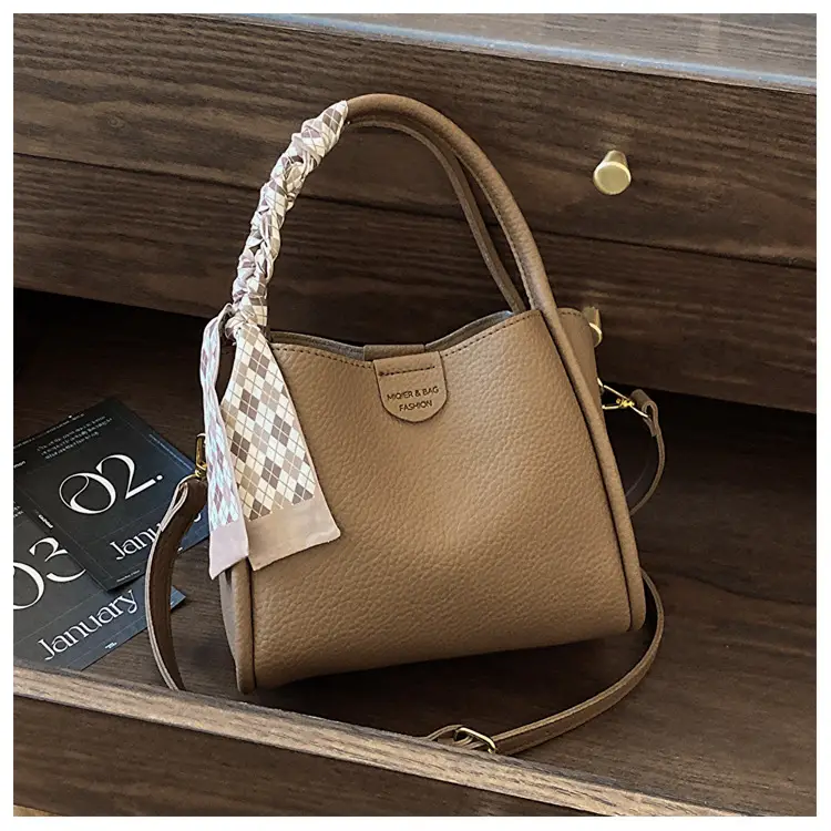 Women's Brown Leather Bucket Bag with Bow Handle — feature 25