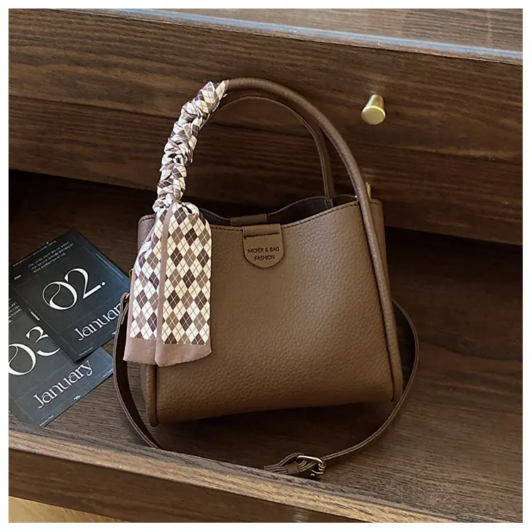 Women's Brown Leather Bucket Bag with Bow Handle — feature 26