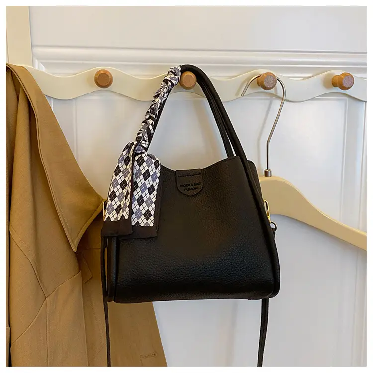 Women's Brown Leather Bucket Bag with Bow Handle — feature 27