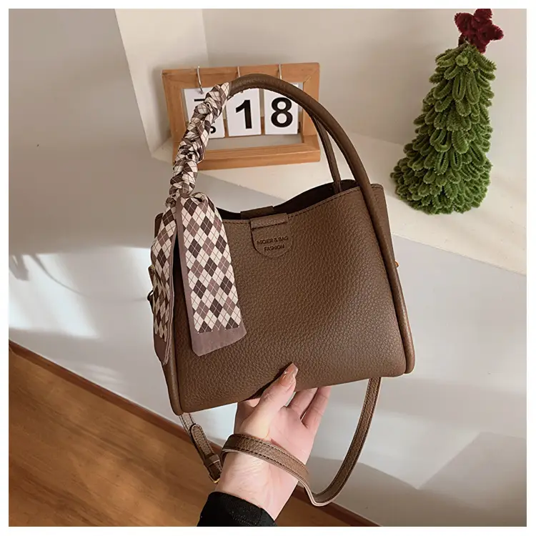 Women's Brown Leather Bucket Bag with Bow Handle — feature 28