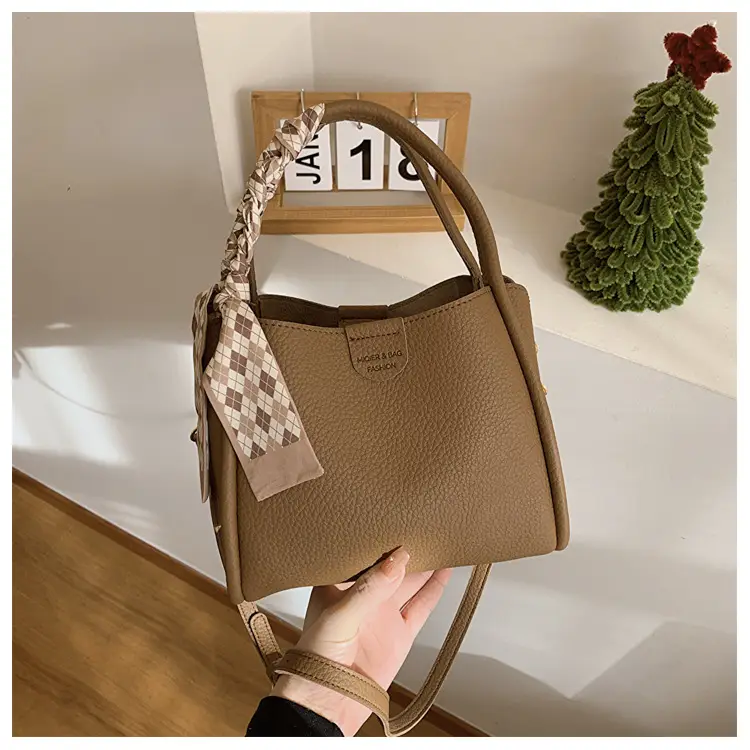 Women's Brown Leather Bucket Bag with Bow Handle — feature 29