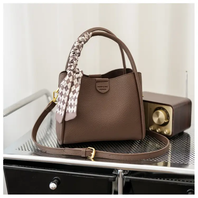 Women's Brown Leather Bucket Bag with Bow Handle — feature 39